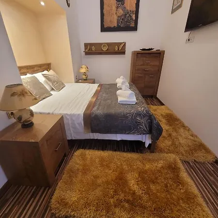 Appartement City Home Boekarest